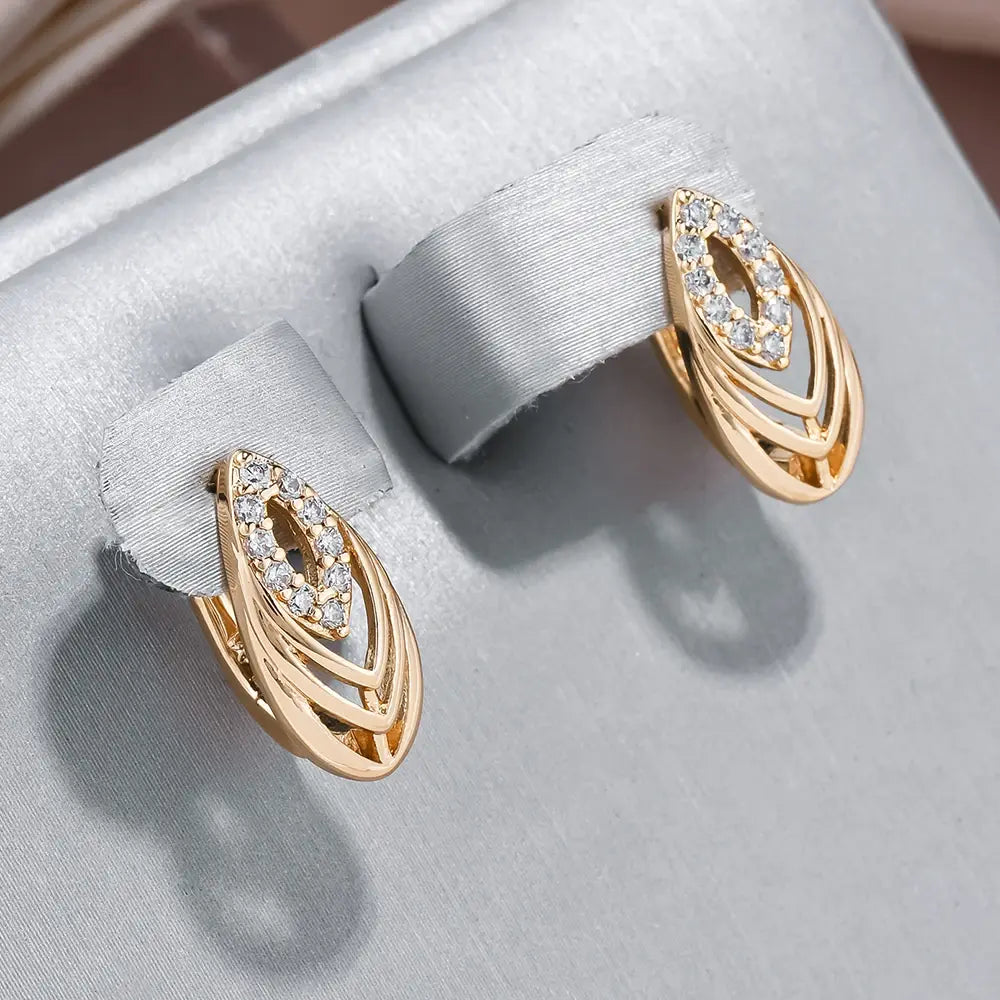 Elegant hollow earrings with inlaid crystal