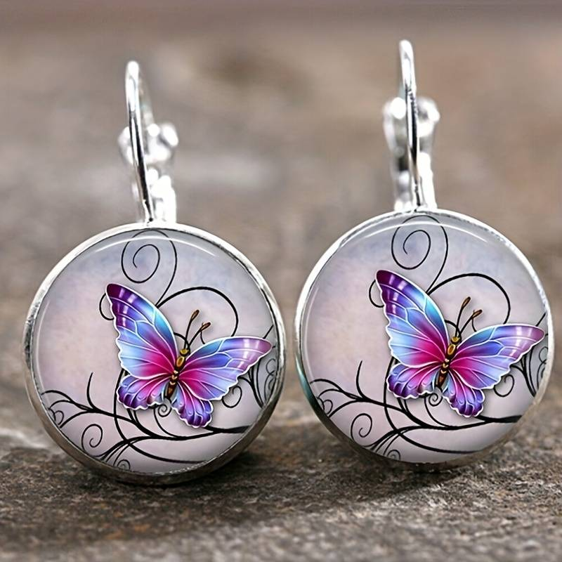 Round earrings with crystal and butterflies