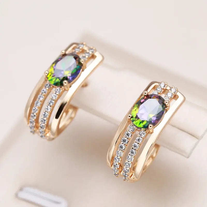 Elegant earrings with zirconia and green crystal in gold