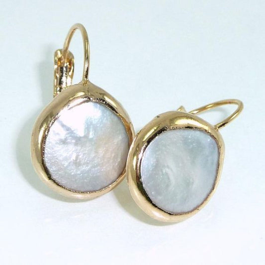 Vintage gold earrings with beautiful white stone