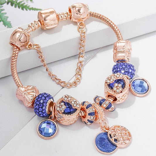 Rose gold bracelet with blue crystal