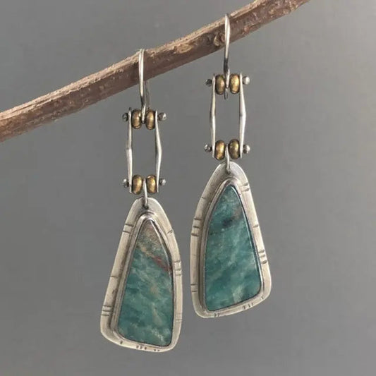 Vintage earrings with green stone in silver