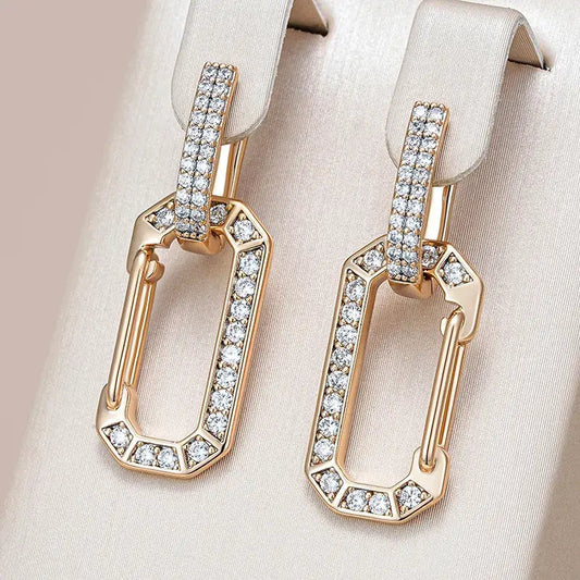 Elegant, shiny earrings with golden recesses