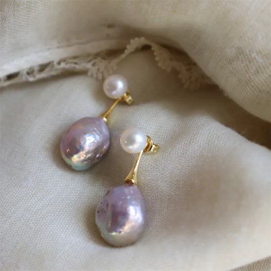 Elegant lilac-colored pearl earrings