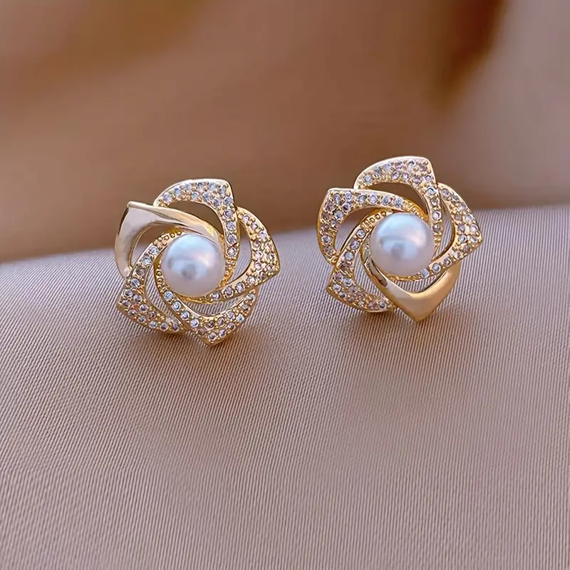 Elegant flower-shaped stud earrings with pearl